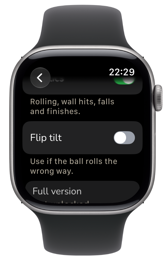 Settings showing the Flip tilt toggle and the note "Use if the ball rolls the wrong way."